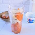 Sweet potato, cottage cheese, egg and maple syrup in blender, ready for mixing